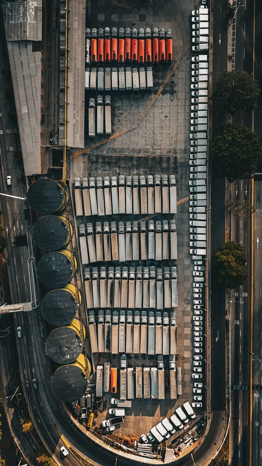 Aerial view of trucks organized at a distribution depot